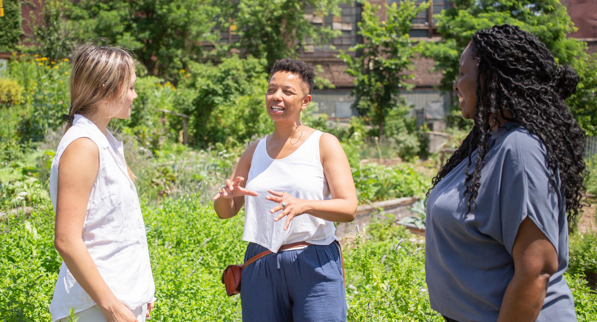 Du talks with community partners 