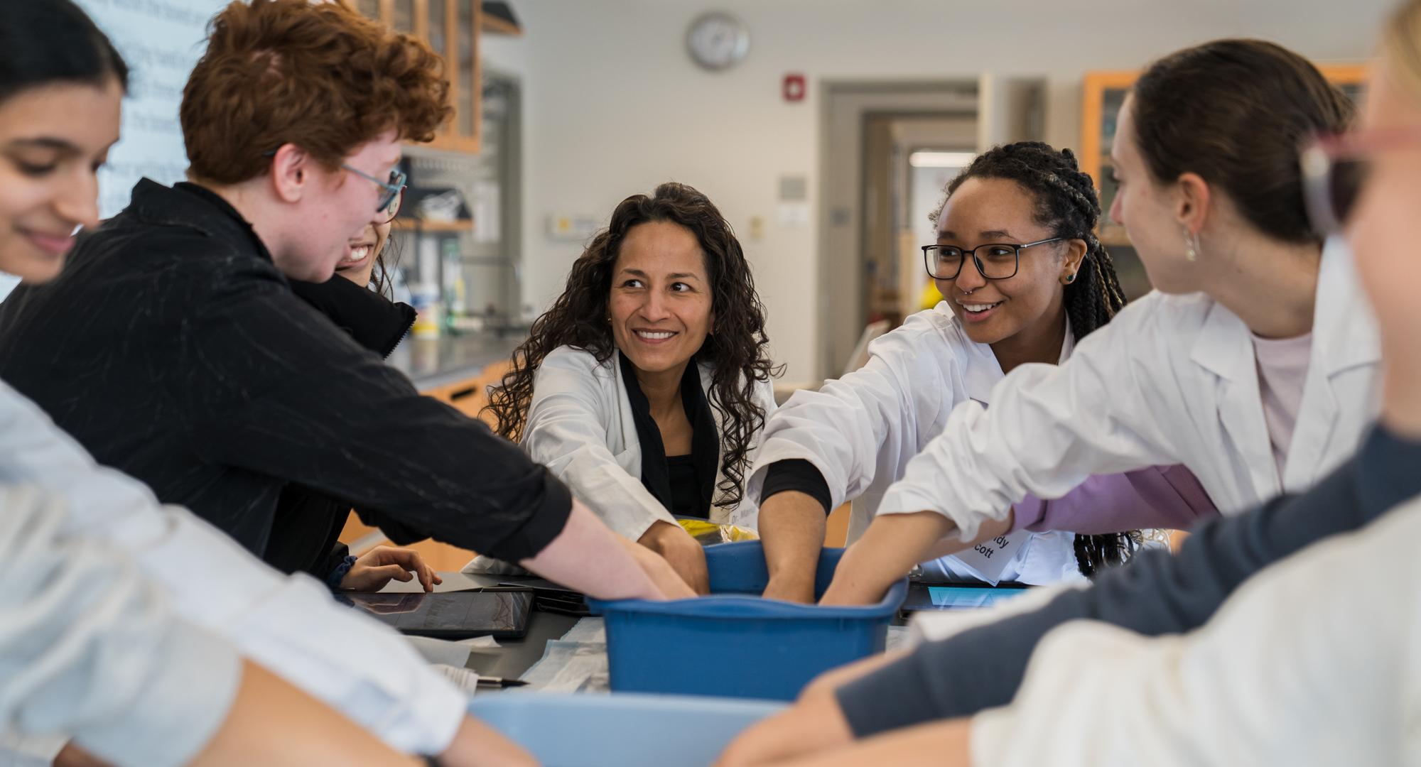 Marla Lujan works with students in anatomy lab
