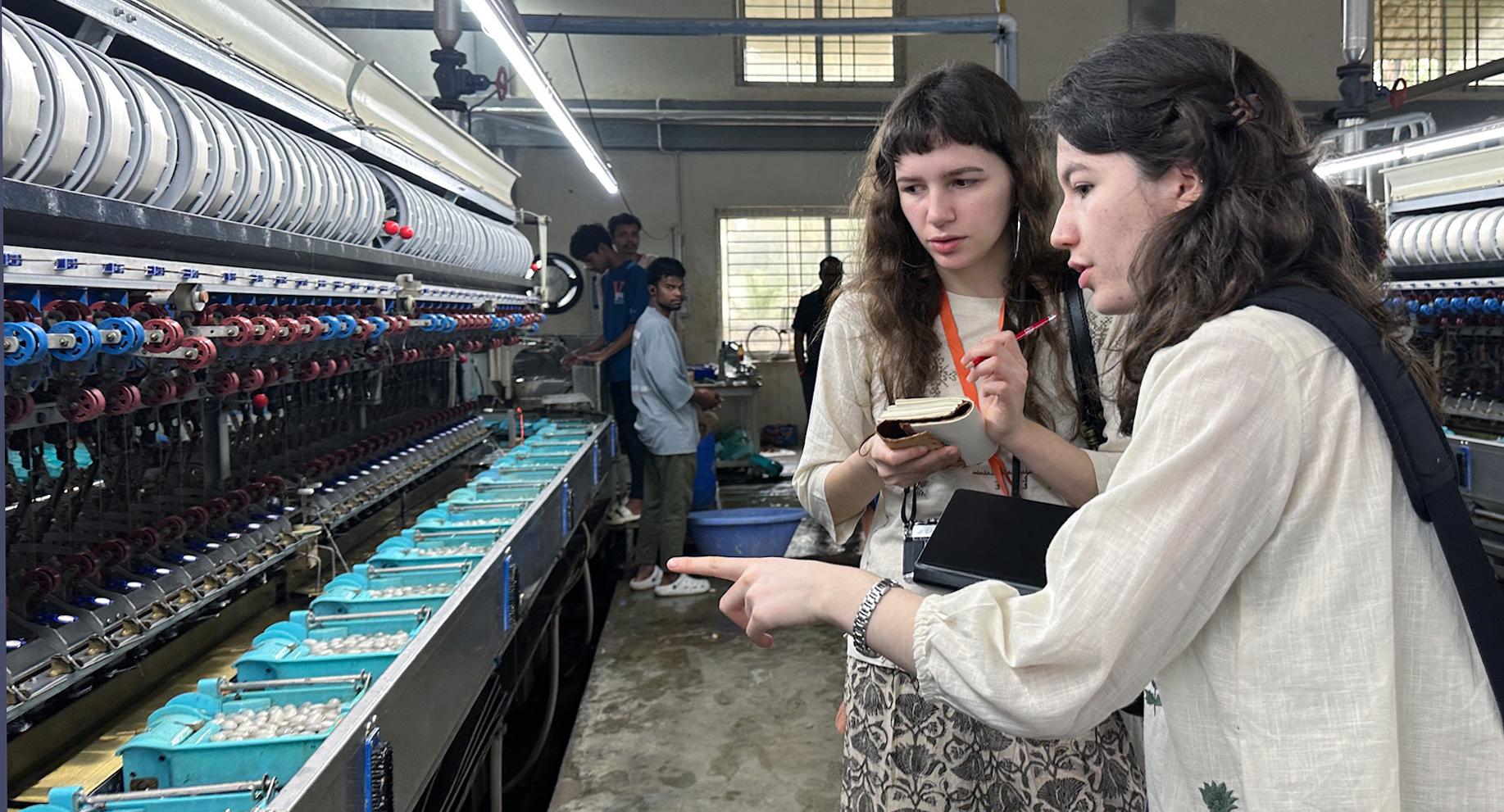 Students observe silk assembly line