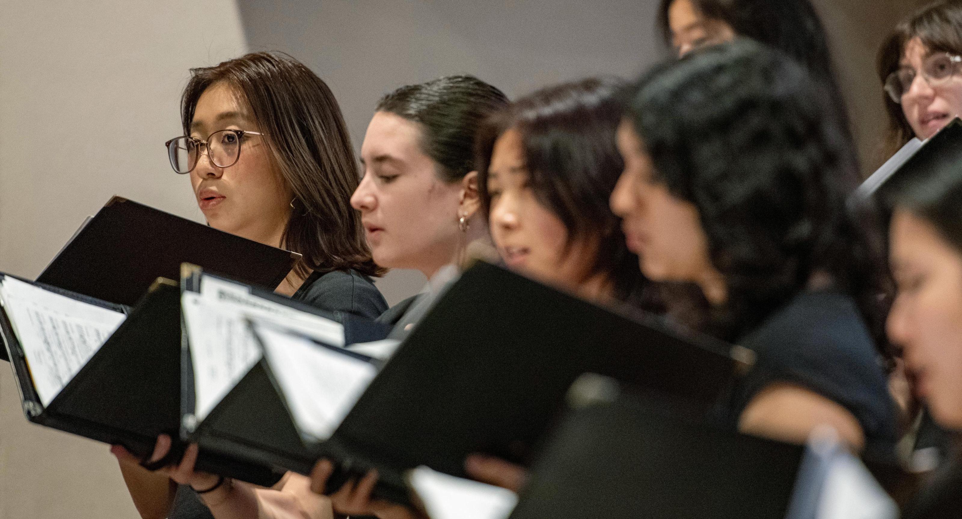 You and choral singers with their music 