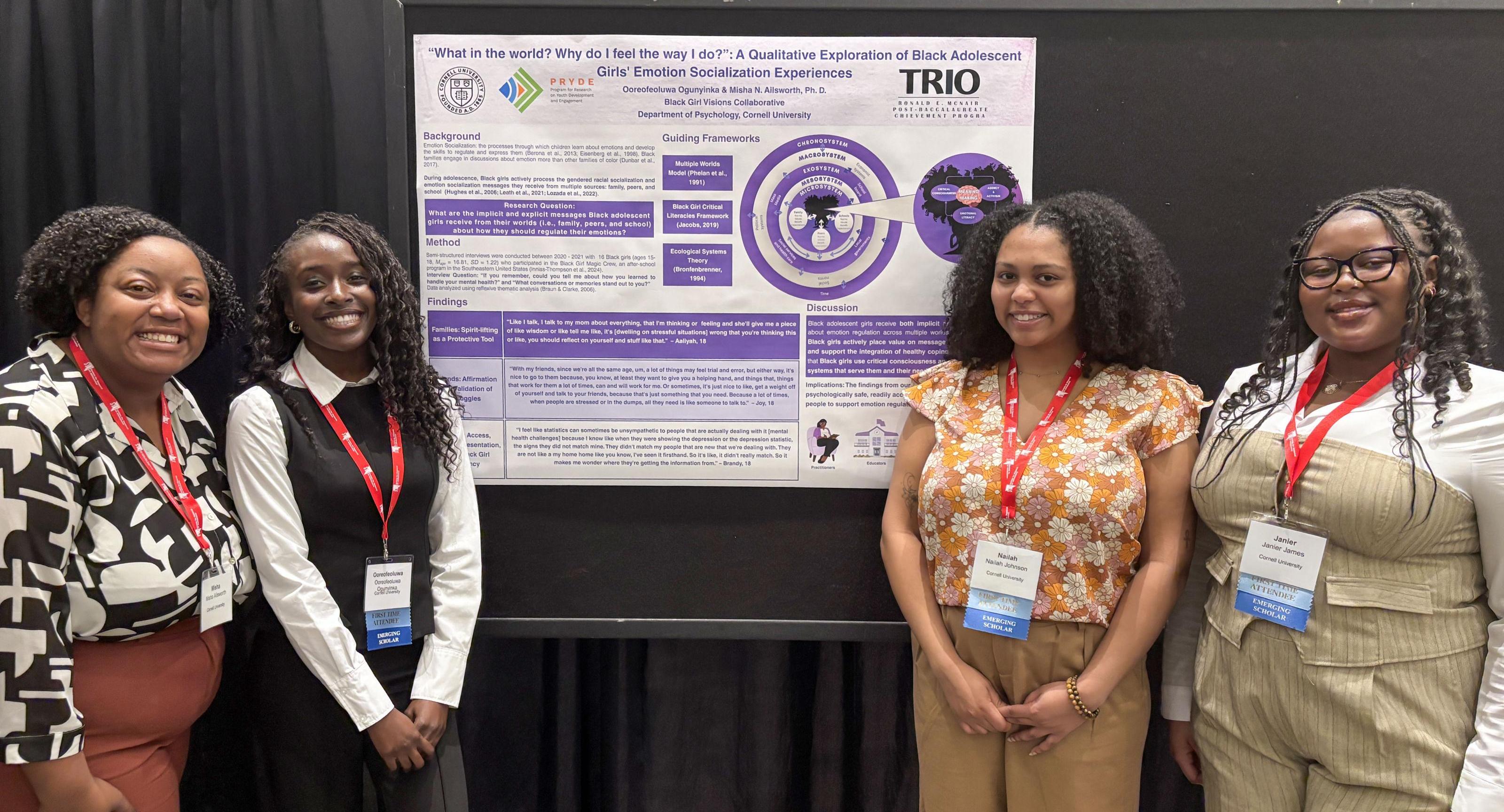 Oore with her research team in front a poster