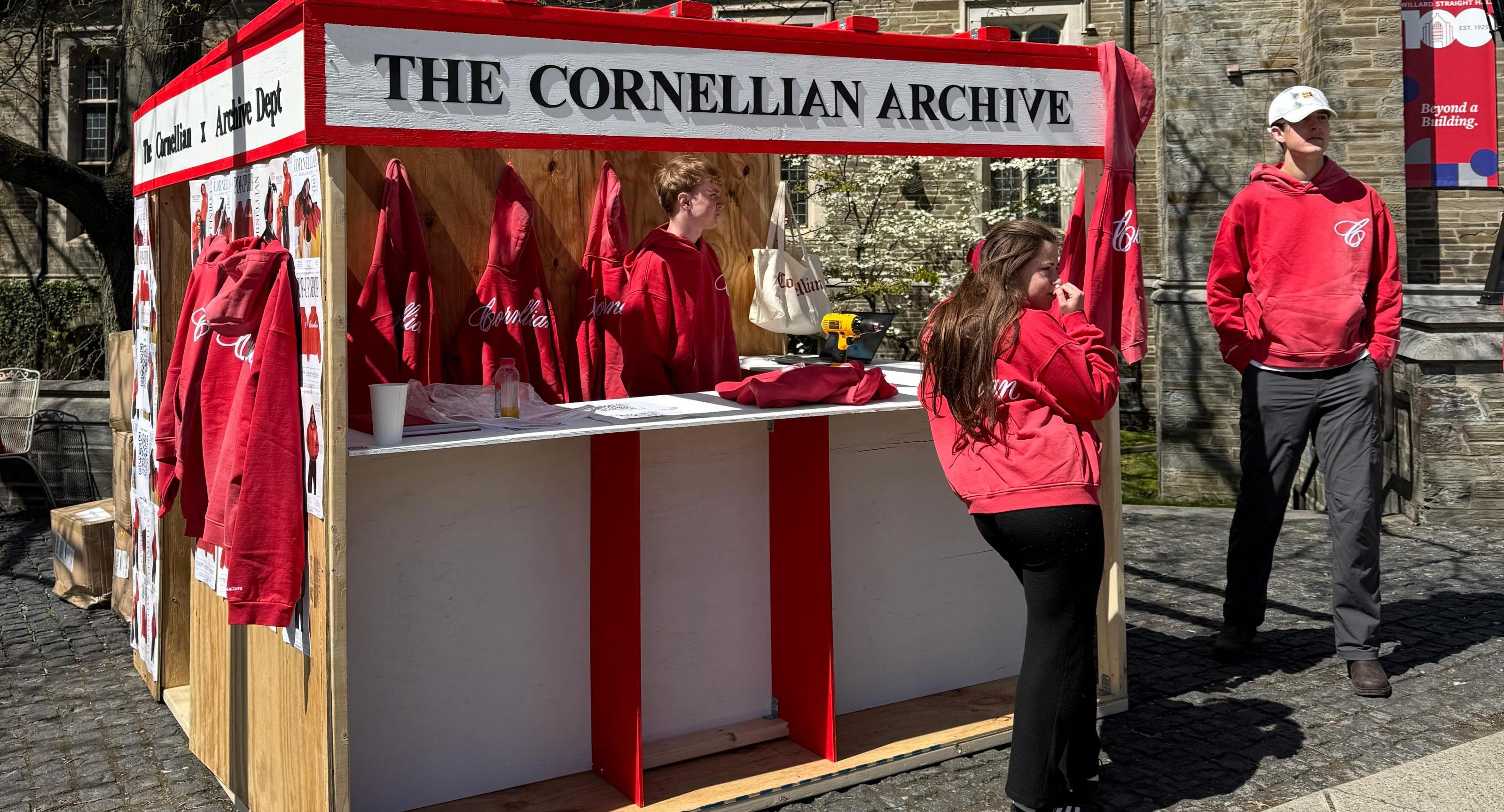 Finished Cornellian pop-up store, a red and white wooden structure