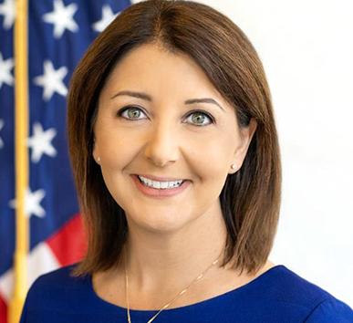 portrait of a woman on a purple and red gradient background