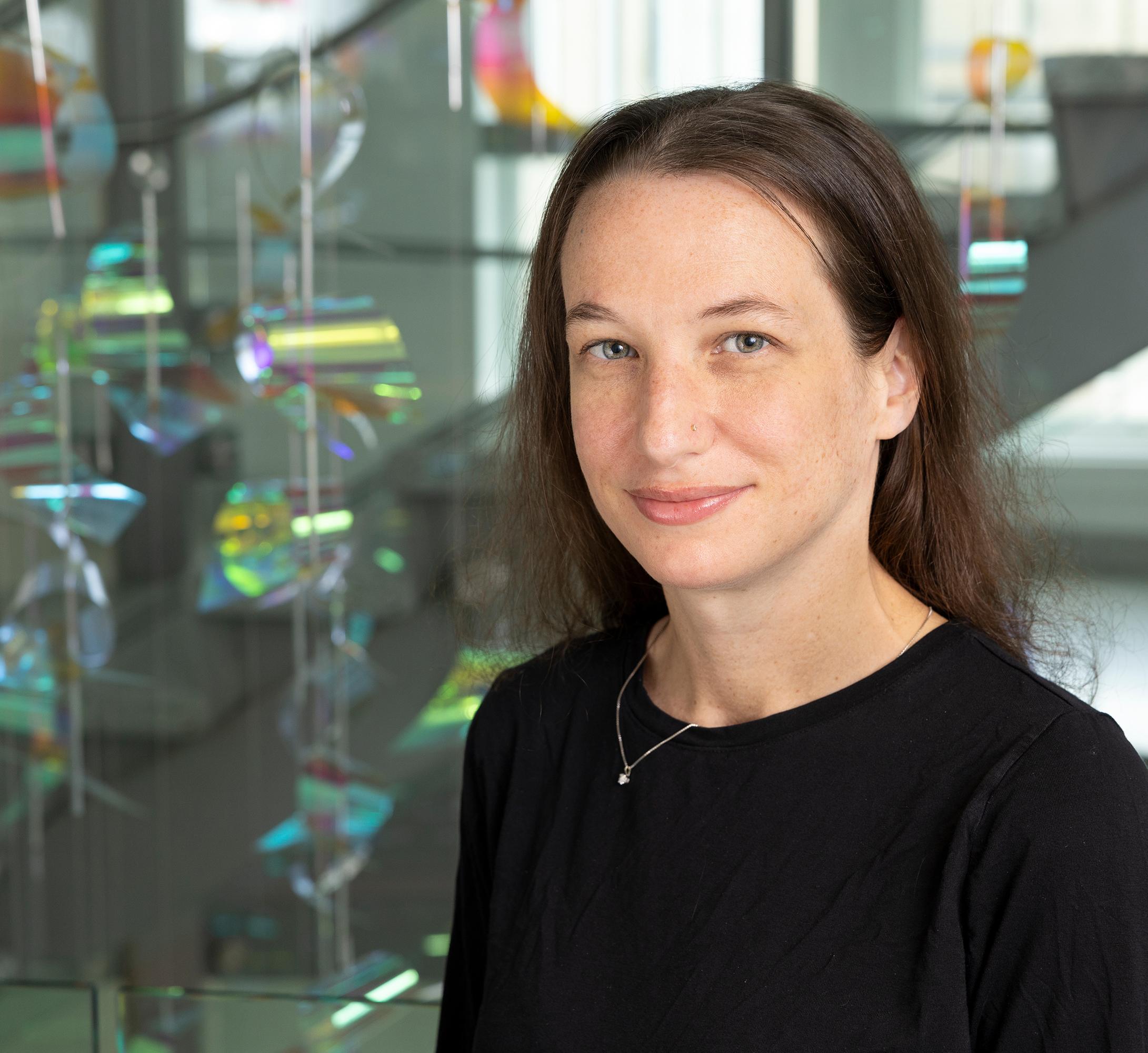 woman standing in front of a staircase