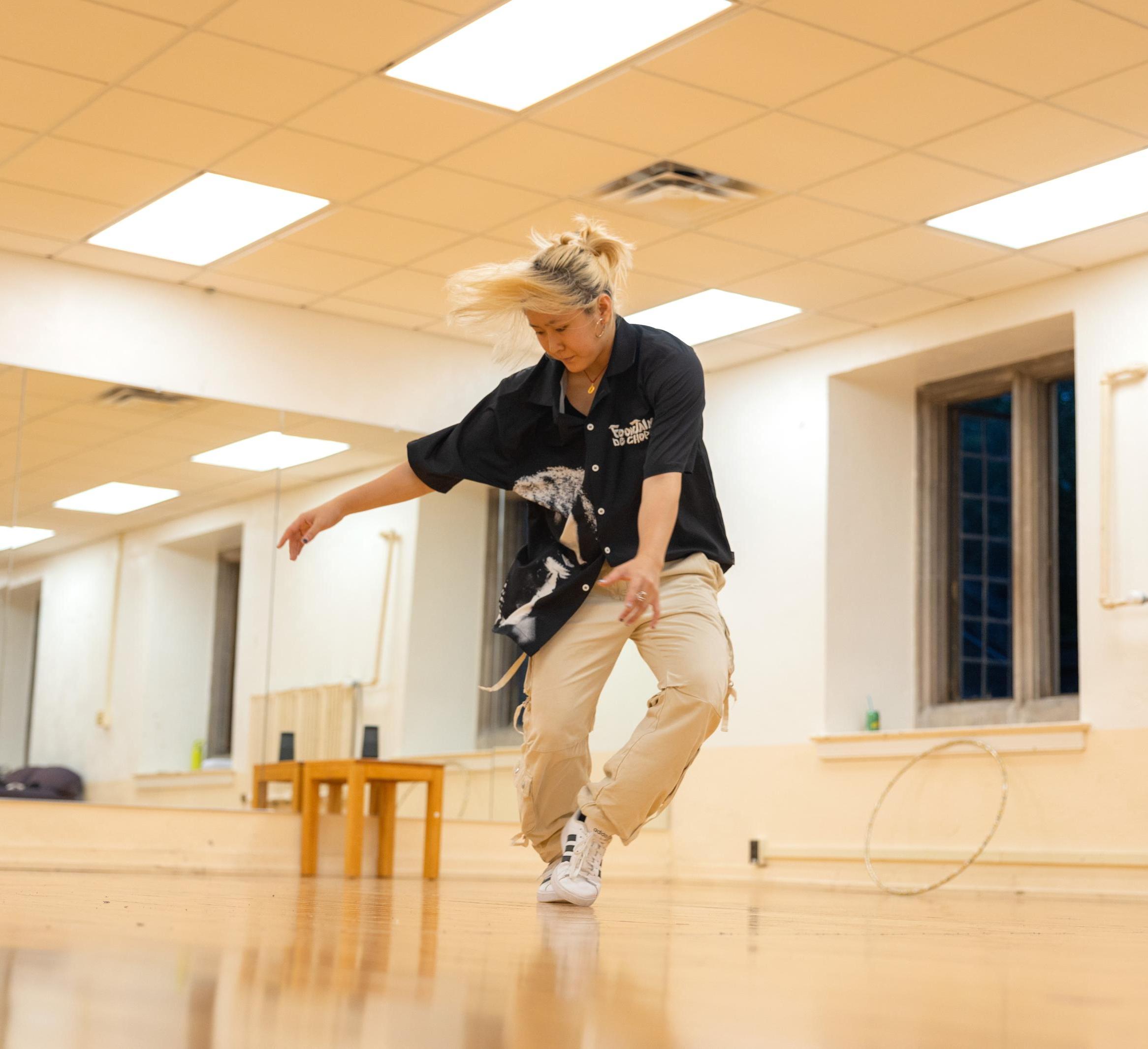a member of Absolute Zero practices hip hop dancing