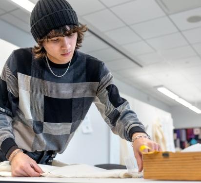 Mattie Nguyen works on a design