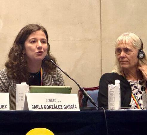 Martha Holden speaks at the CARE conference 