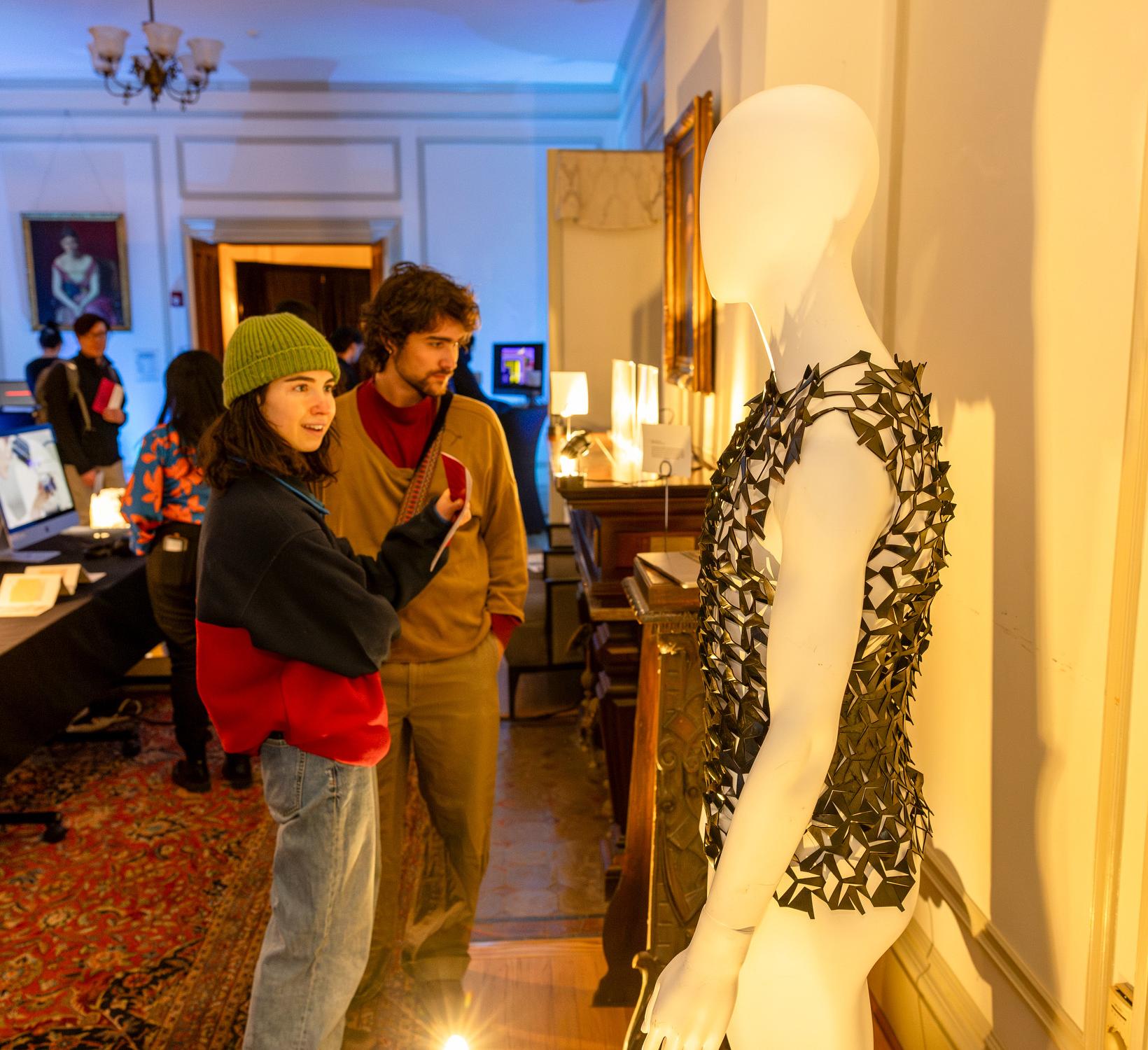 guests look at a mannequin in the AD White House 