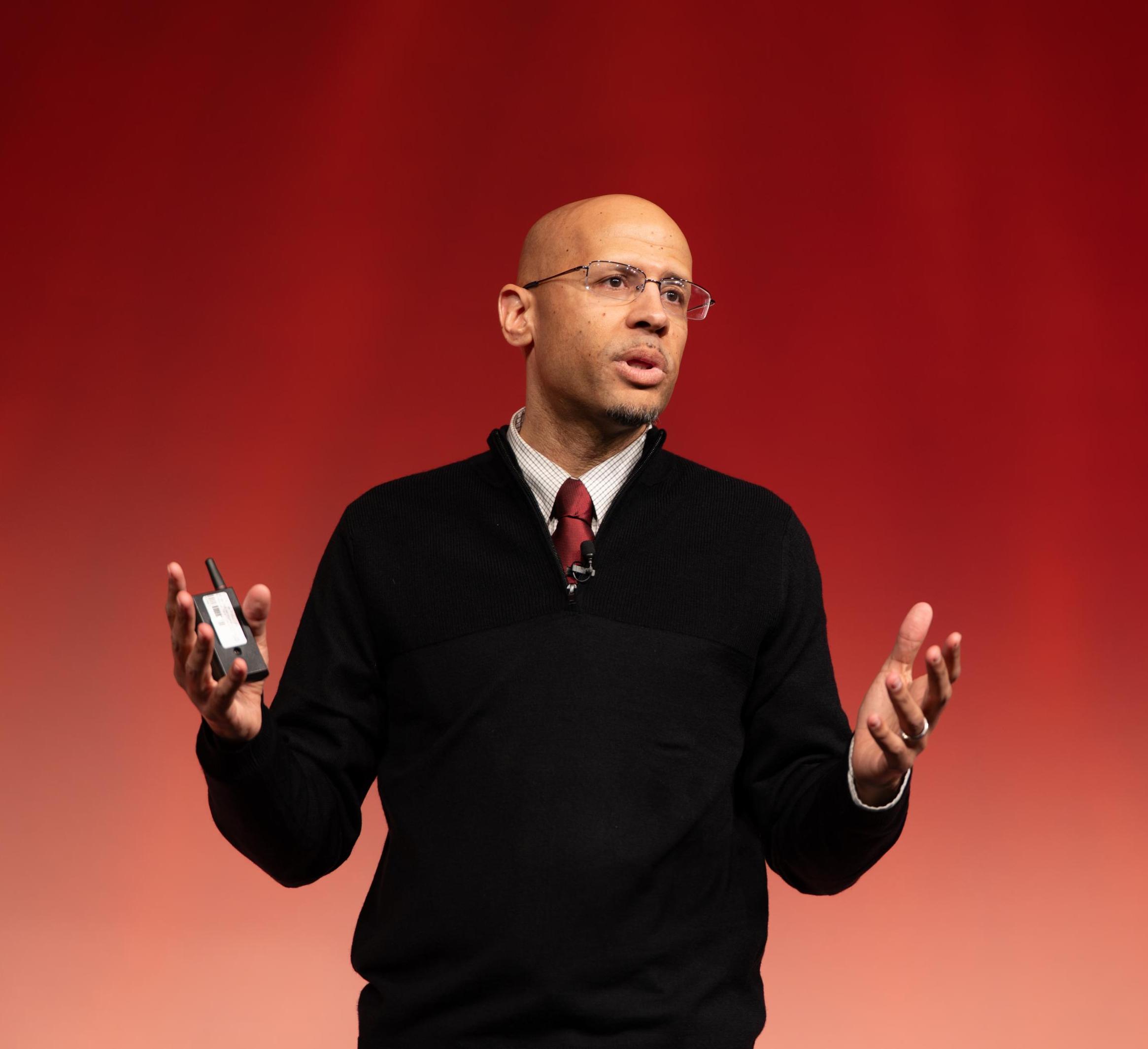 Anthony Burrow speaks on stage