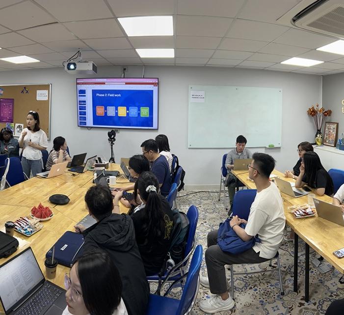 SCDI’s Trang Minh Nguyen, program manager for harm reduction and addiction treatment and children and youth programs, speaks to the team in preparation for work with VACEP storytelling partners in the SCDI offices in Hanoi.