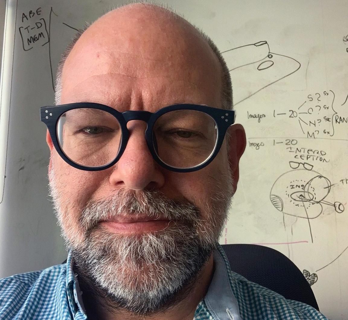 man with black framed glasses 