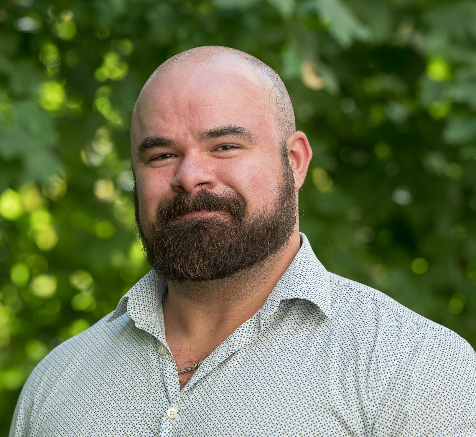 Portrait of Adam Hoffman outside