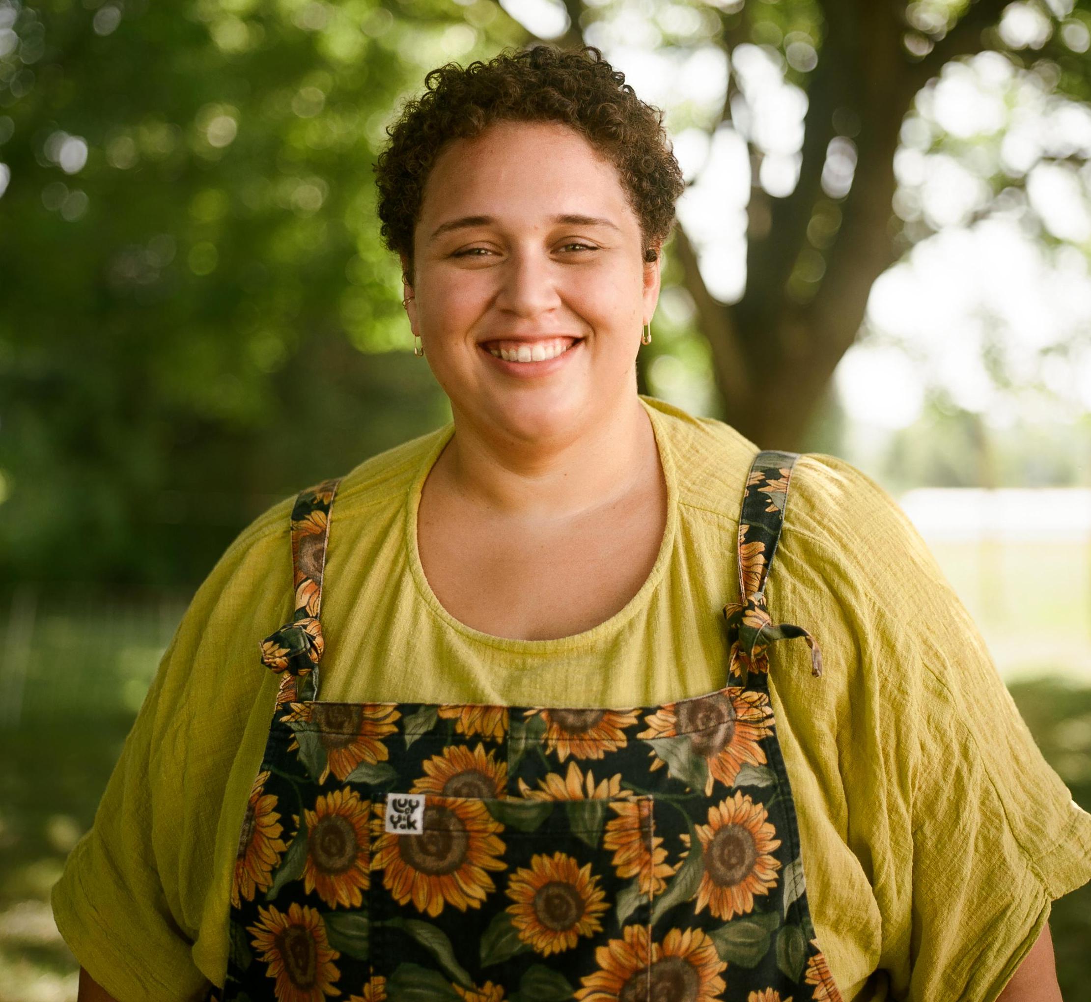 Portrait of Paige Tomfohrde in sunflower overalls 
