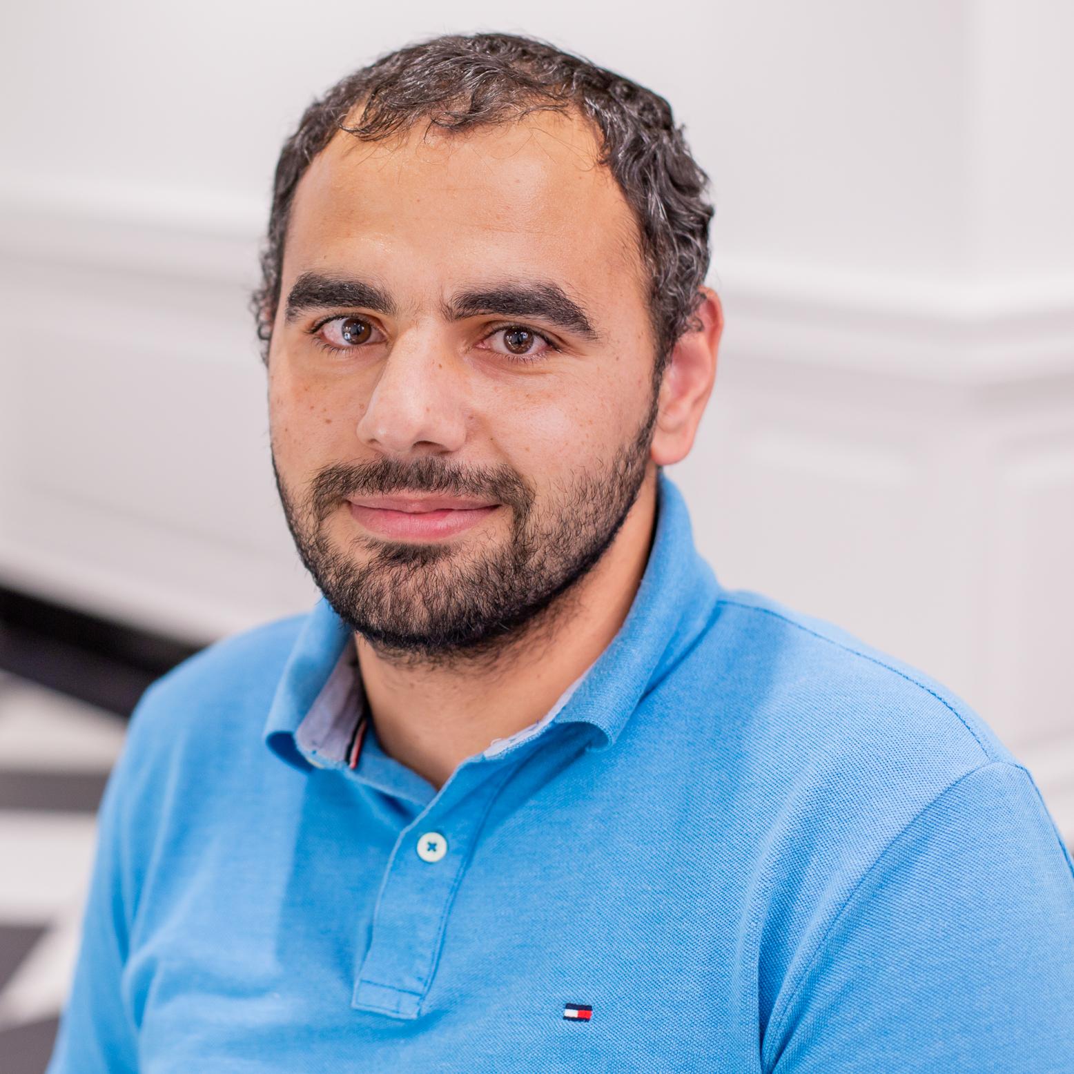 man in a light blue shirt