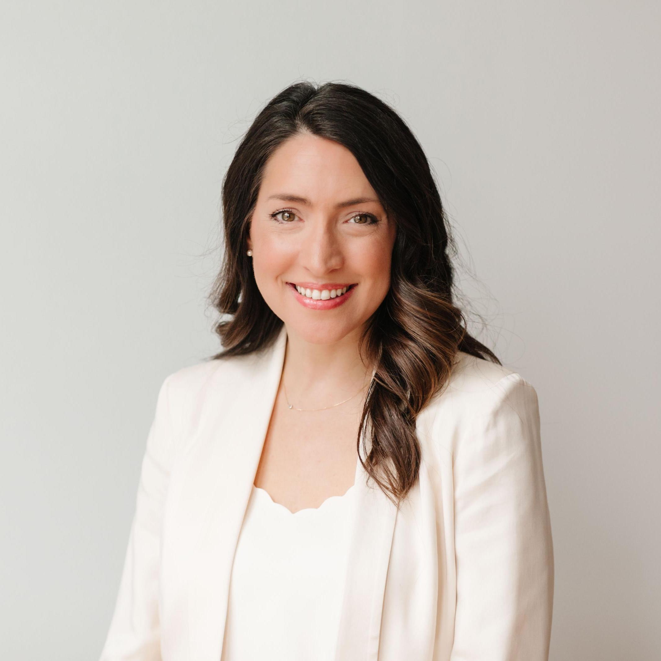 woman with a white suit