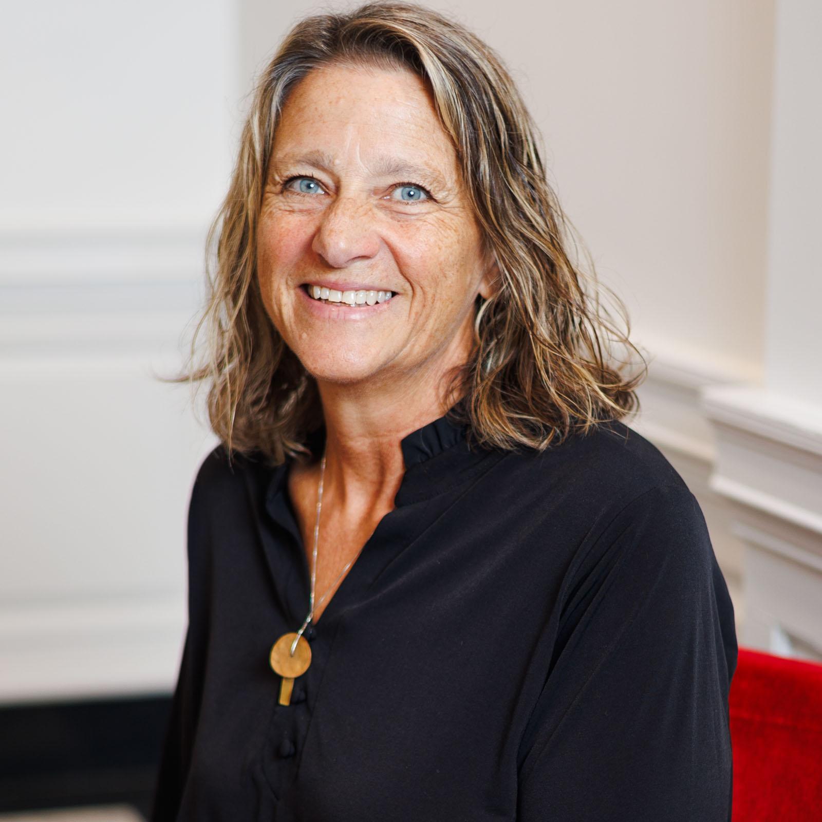 Smiling woman in black shirt