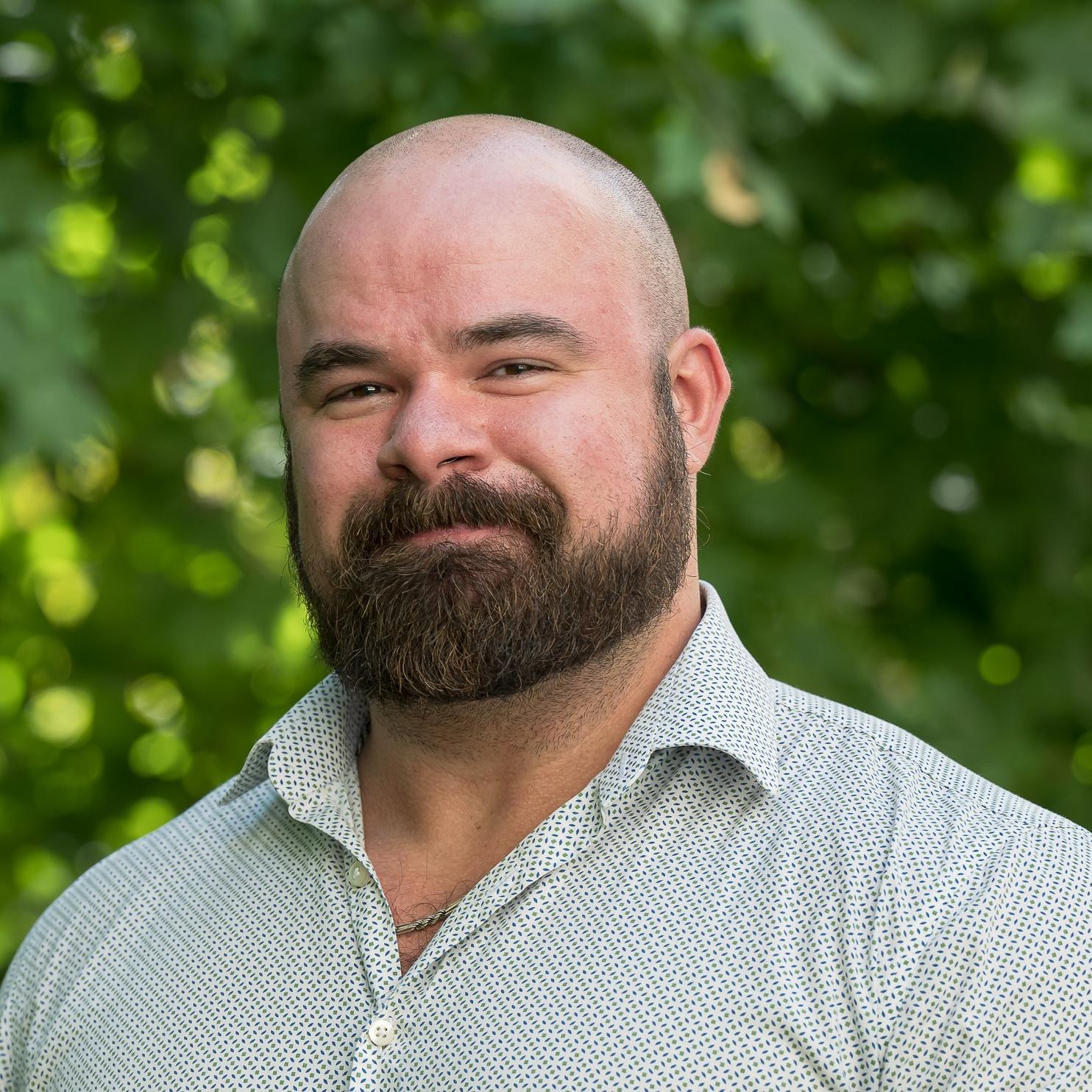 Portrait of Adam Hoffman outside