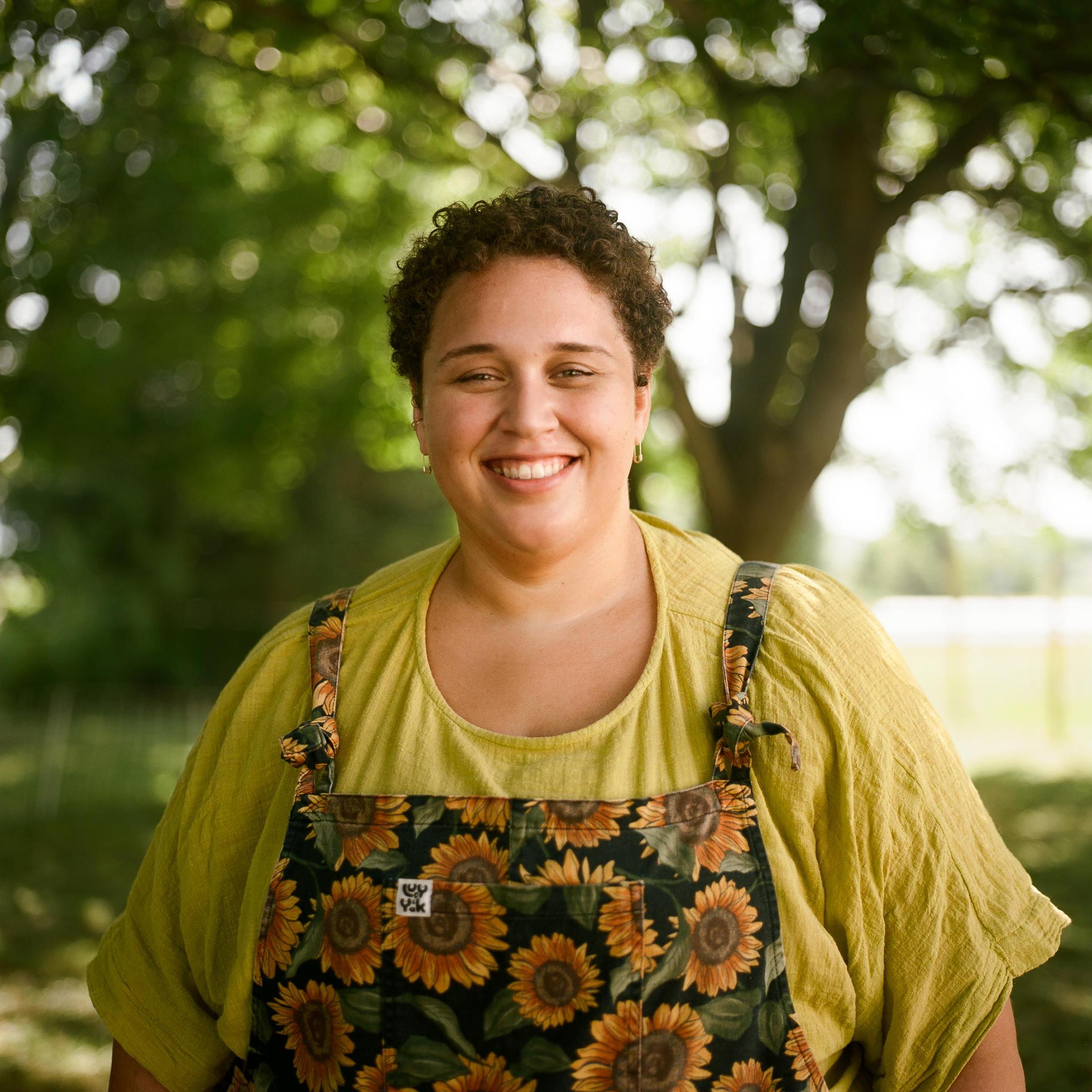 Portrait of Paige Tomfohrde in sunflower overalls 