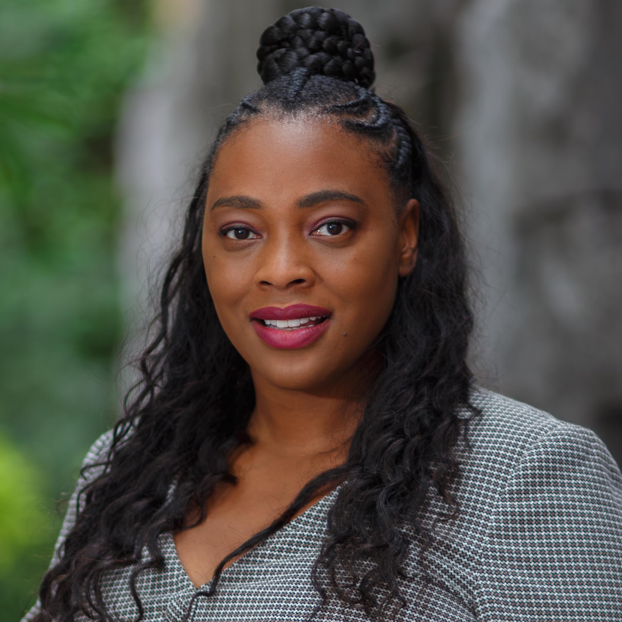 woman wearing a checked top
