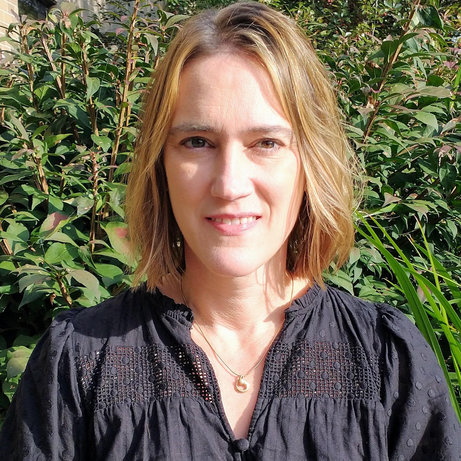 portrait of a woman in a black blouse