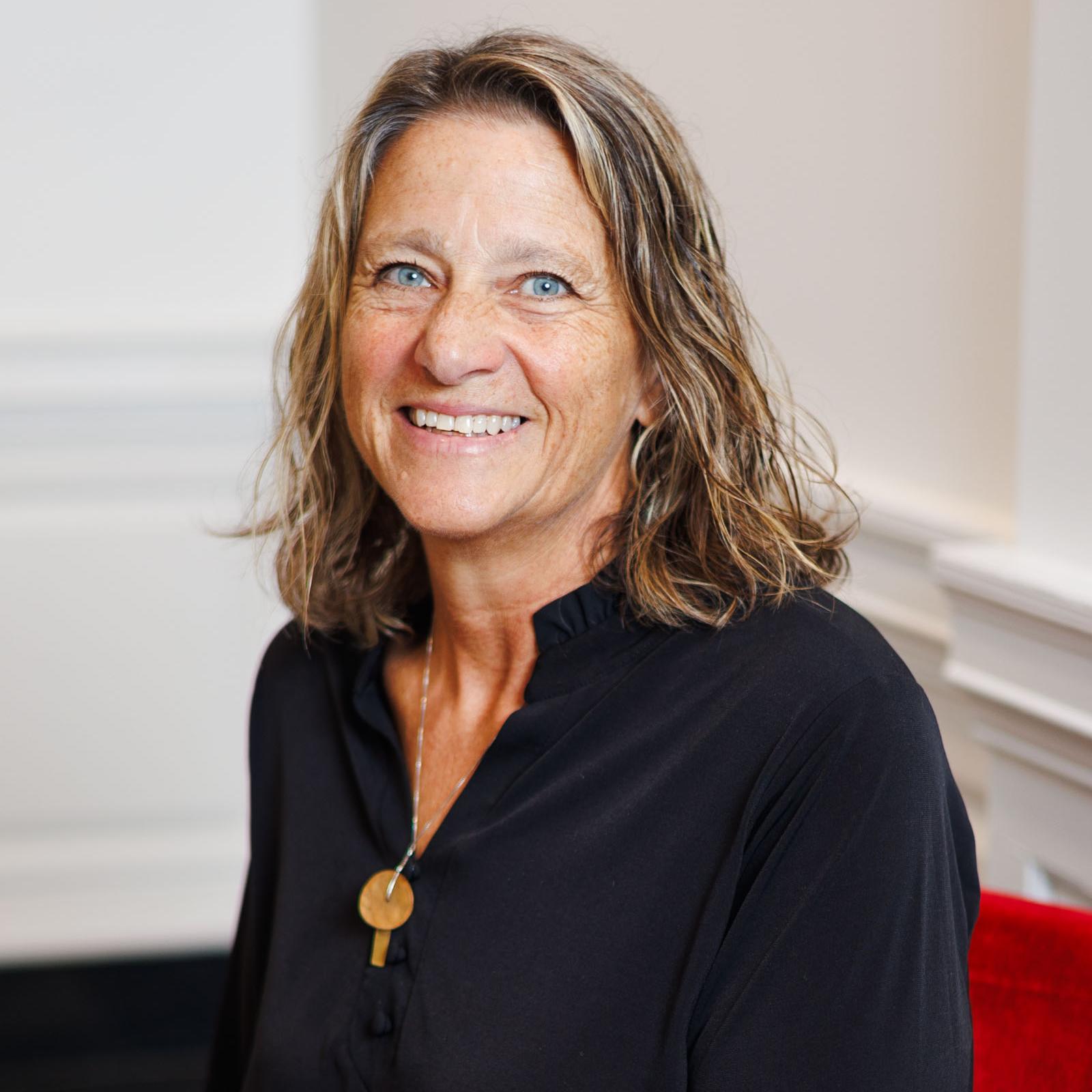 Smiling woman in black shirt