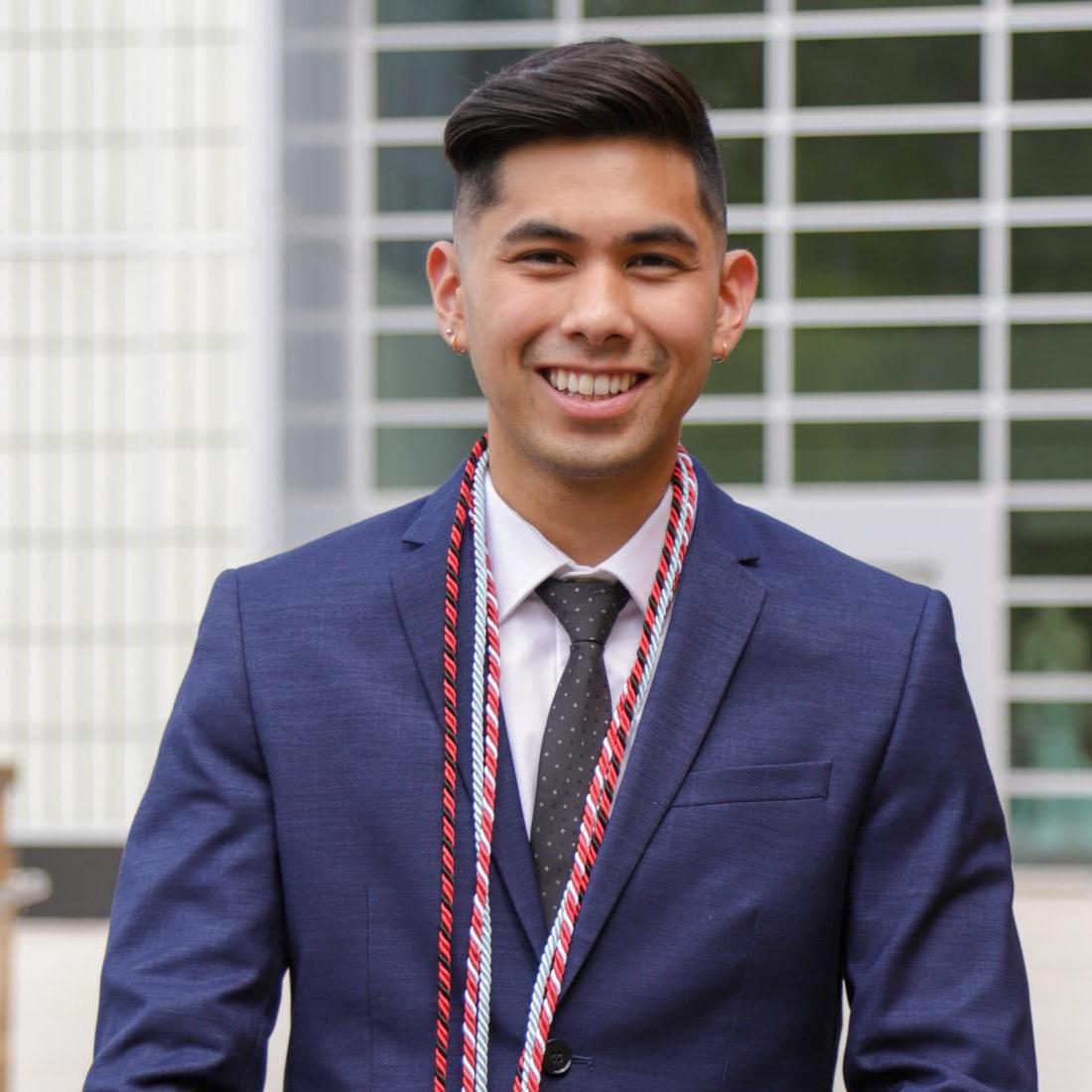 Kyle Muna with his graduation cords