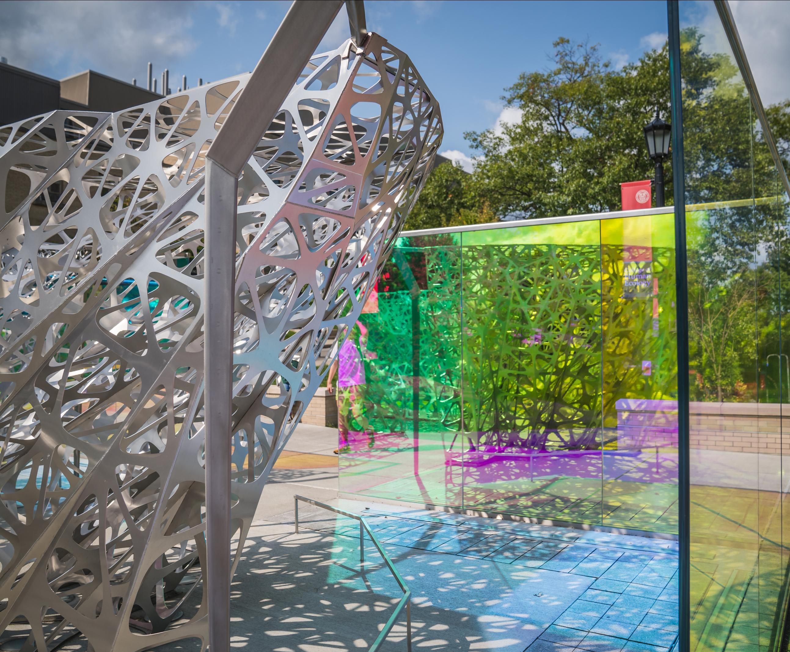 large outdoor metal and glass sculpture