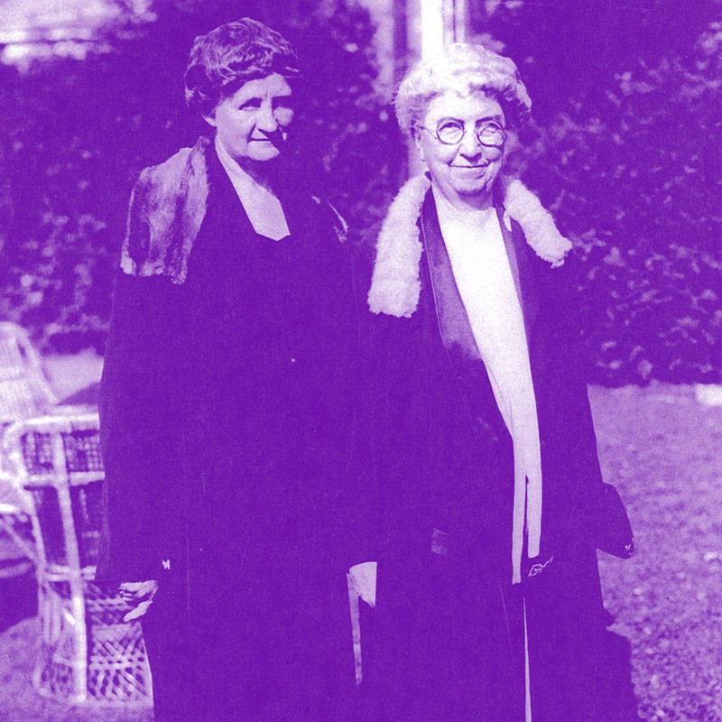 1916 BW photo with purple color overlay of two women