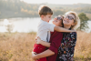 Family in front of a lake