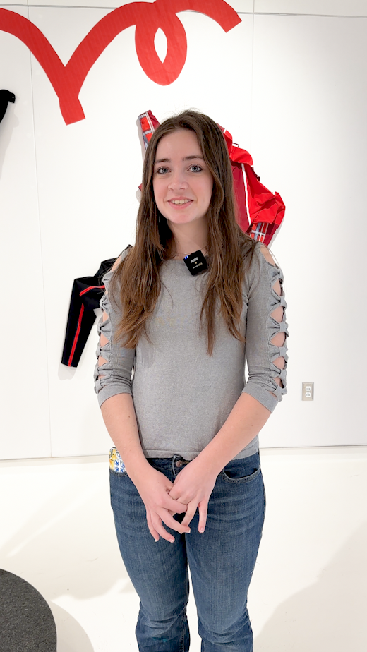 Margaret Watkins standing in front of an exhibit