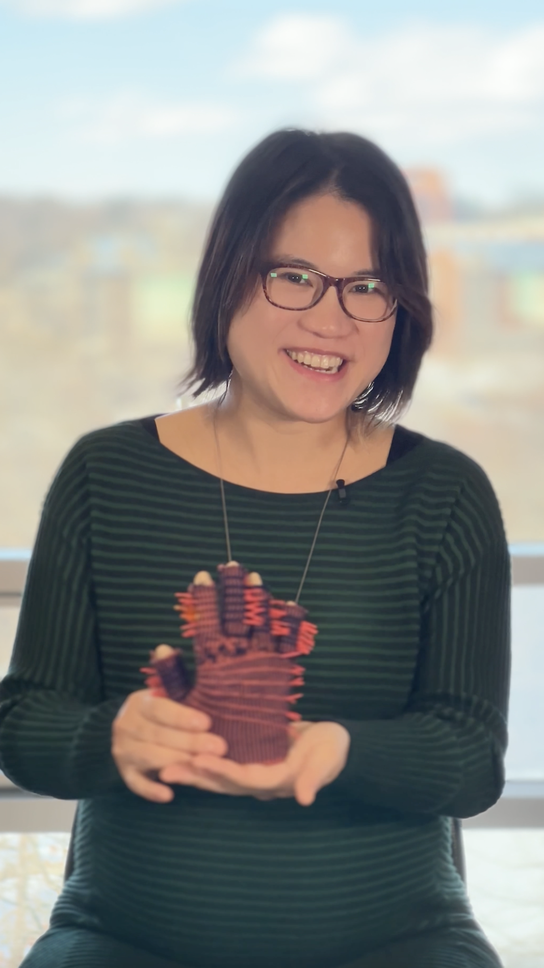 Cindy Kay with a hand edema device